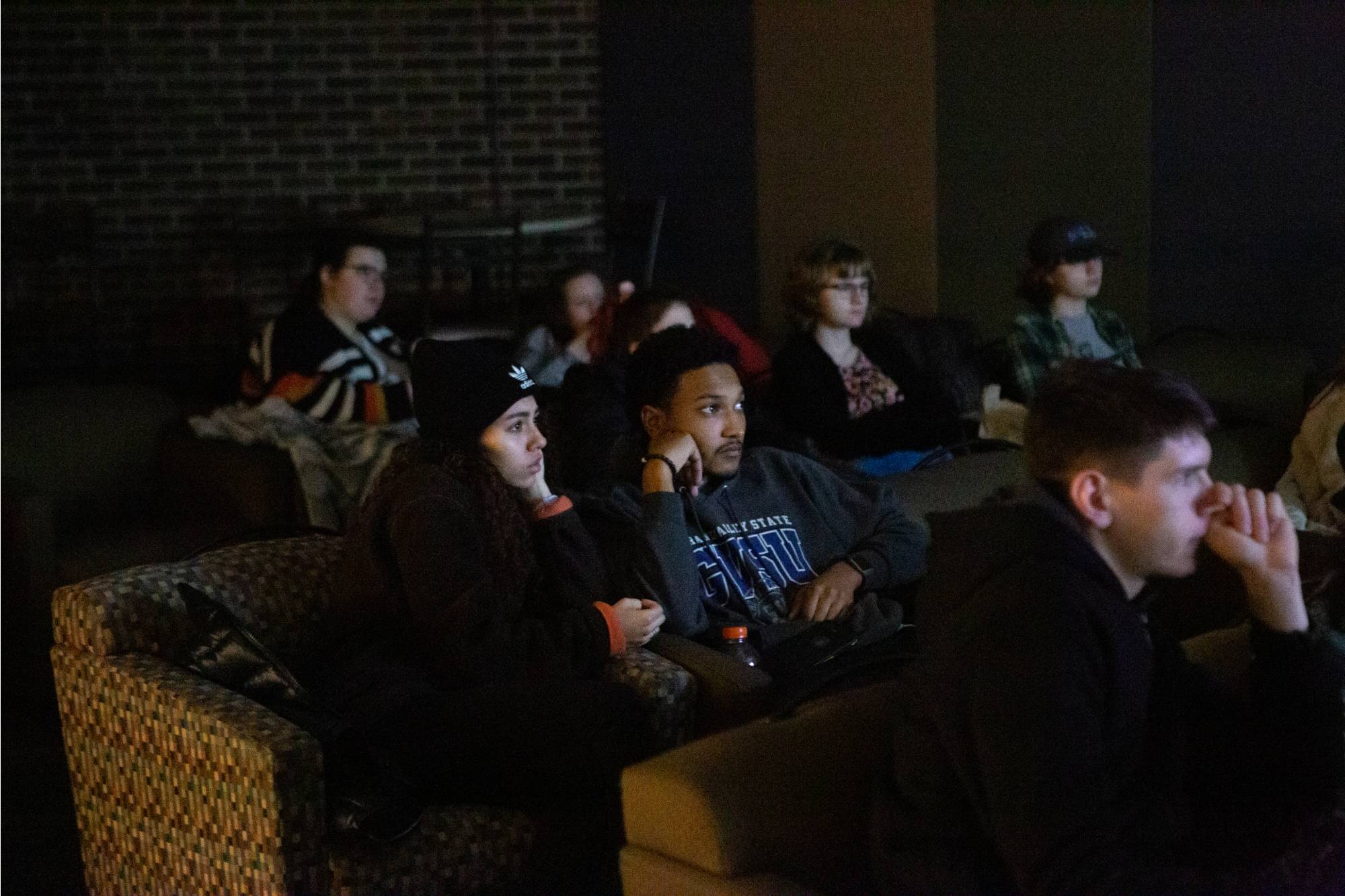 Students watching a movie in the Big Screen Theater.